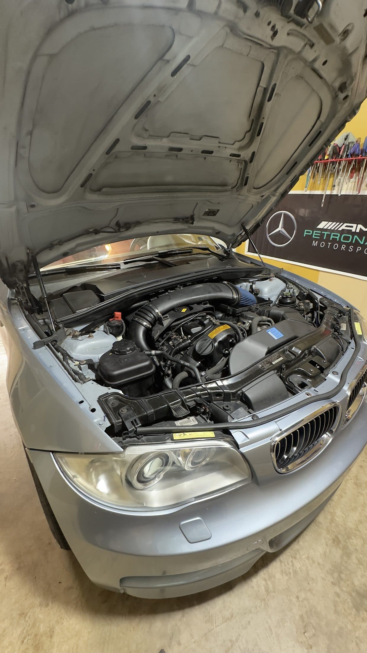 Engine bay open mid-service, German auto repair Northern Virginia