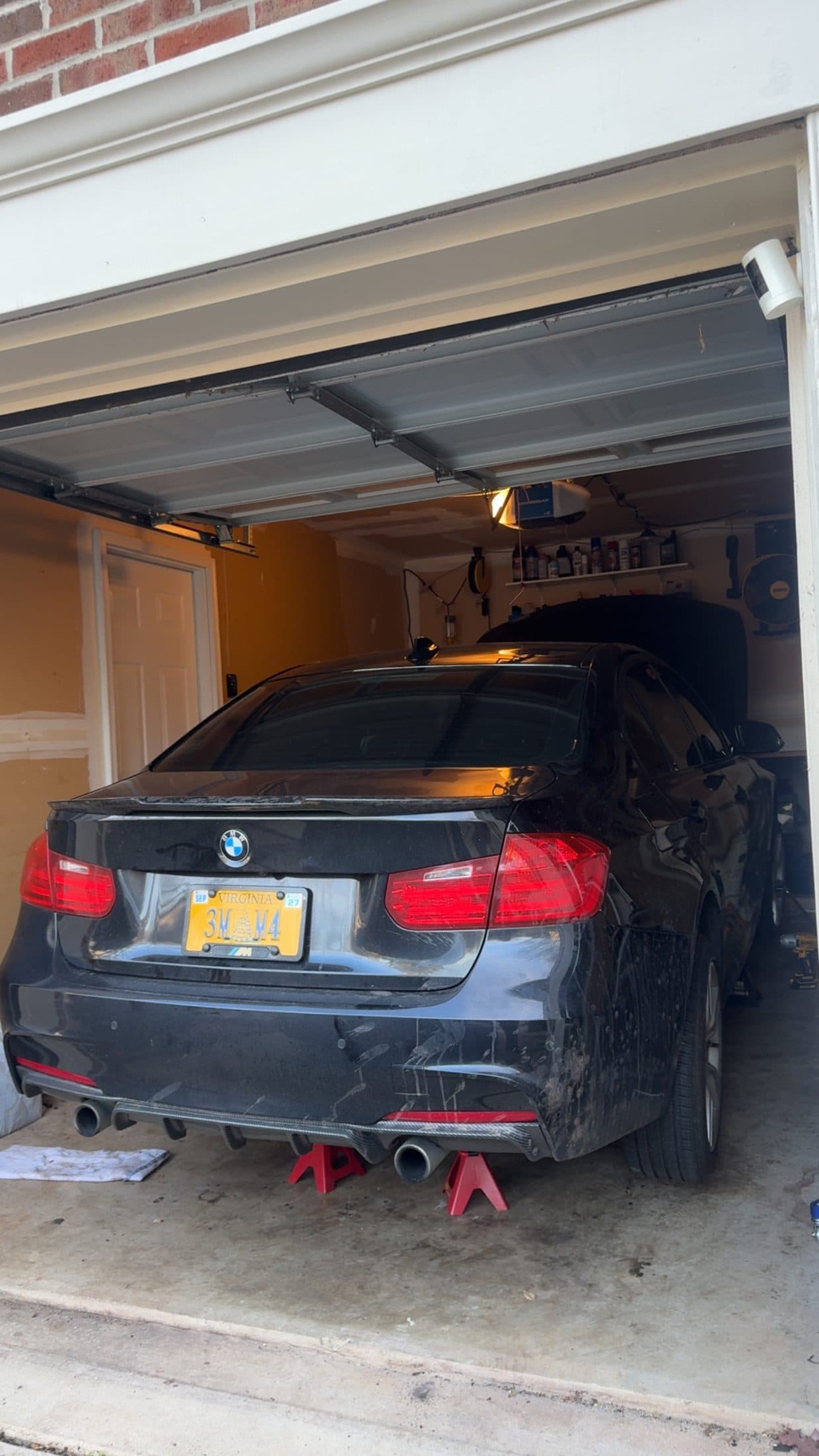 Black BMW 5 Series rear with diffuser, BMW performance DMV