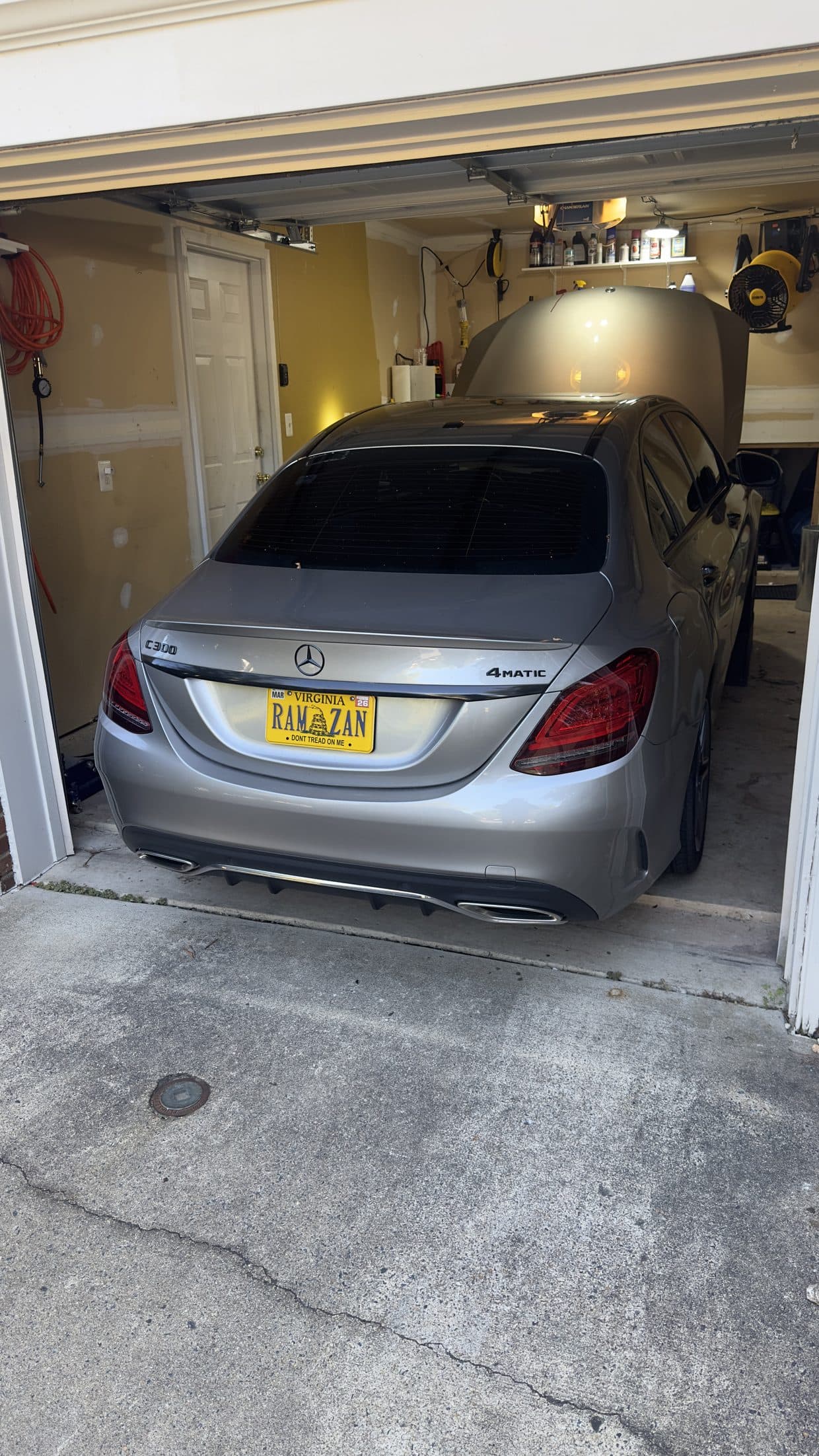 Silver Mercedes-Benz C-Class front in driveway, Mercedes service DMV