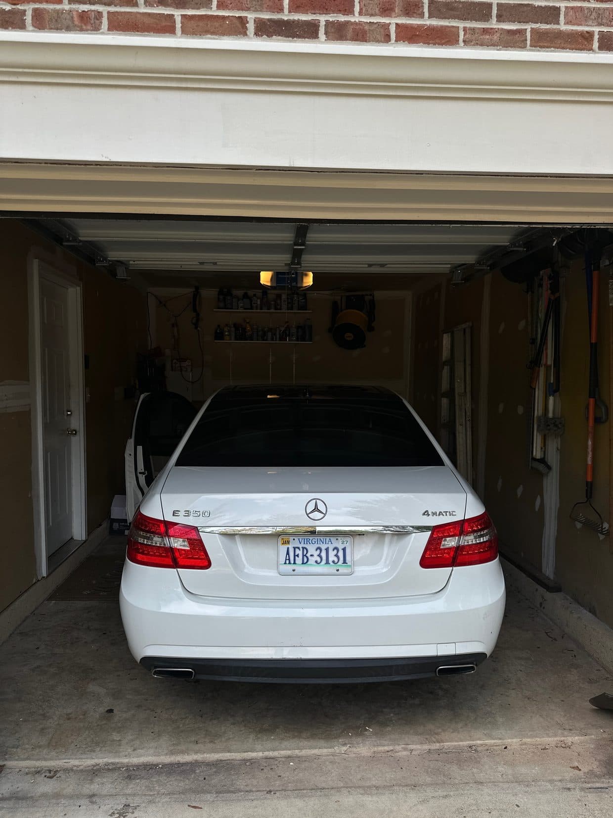 White Mercedes-Benz E-Class rear in garage, Mercedes repair Northern Virginia