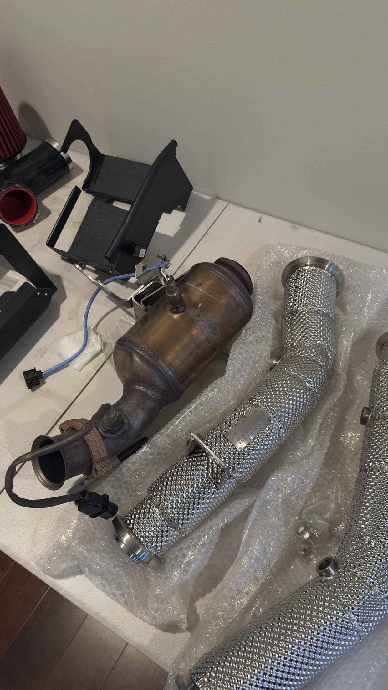 Exhaust and catalytic components on shop floor, exhaust service Sterling VA
