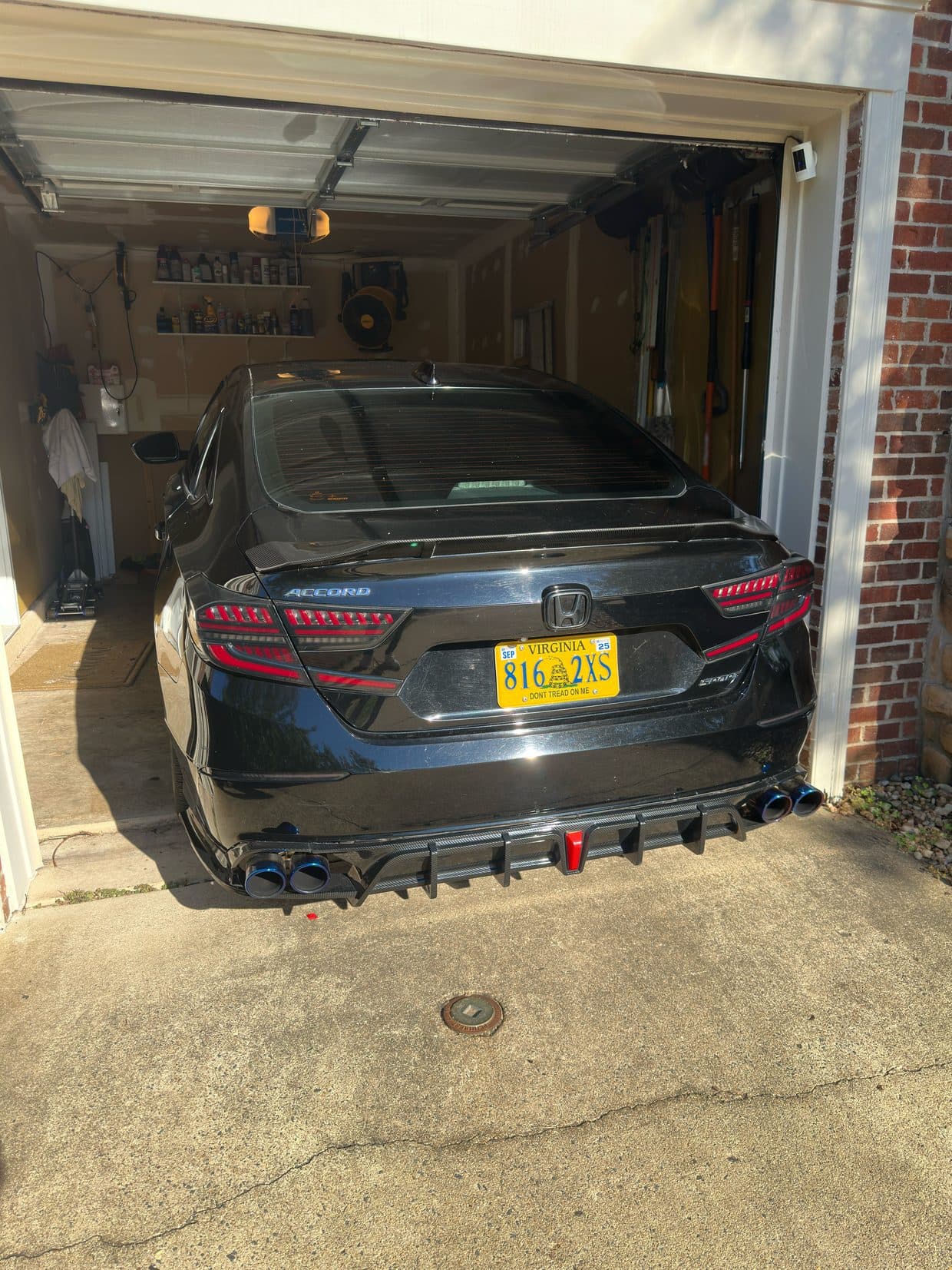 Gray Mercedes-AMG rear with diffuser in garage, AMG performance Sterling VA